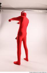 JOEL_ADAMSON CHRISTMAS VILLAIN WITH TWO GUNS